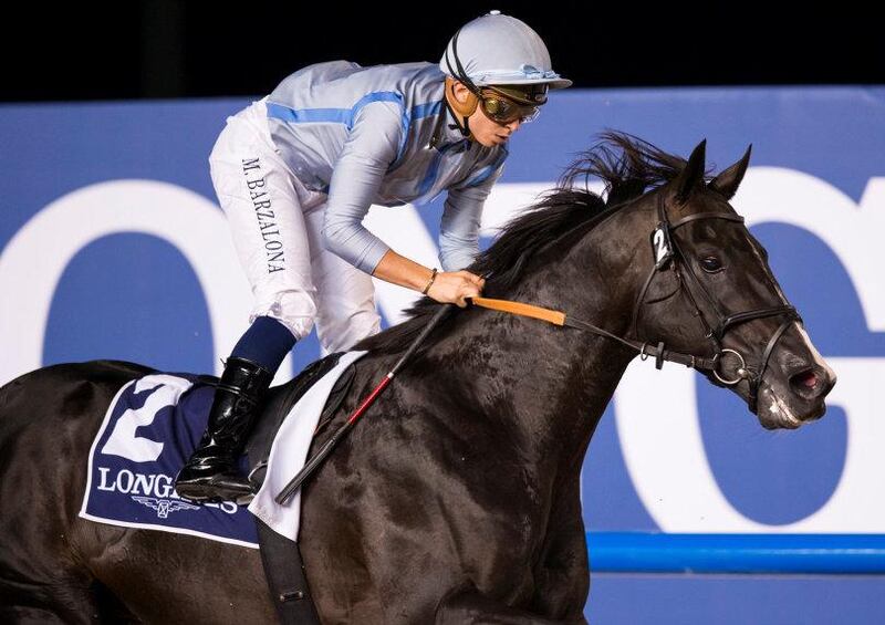 Mickael Barzalona guided Heavy Metal to victory at Meydan Racecourse on Thursday night. Erika Rasmussen for The National