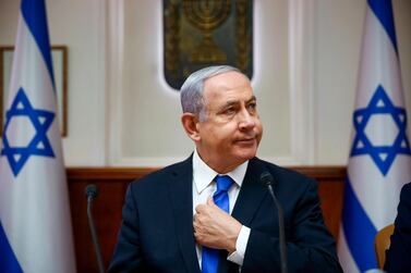 (FILES) In this file photo taken on June 30, 2019, Israeli Prime Minister Benjamin Netanyahu chairs the weekly cabinet meeting at his office in Jerusalem. Netanyahu is set to surpass founding father David Ben-Gurion as Israel's longest-serving prime minister, having notched up a list of diplomatic and economic successes but with right-wing leadership many see as deeply divisive. The 69-year-old Netanyahu on July 20 will have served as Israel's prime minister for a total of 4,876 days -- over 13 years, according to a calculation by the Israel Democracy Institute think tank. / AFP / POOL / Oded Balilty