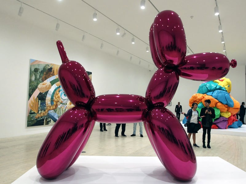 epa07577255 'Balloon Dog' by Jeff Koons is displayed during the exhibition 'Naked Appearance: The Desire and object of Marcel Duchamp and Jeff Koons' at the Jumex Museum in Mexico City, Mexico, 16 May 2019.  EPA/MARIO GUZMAN