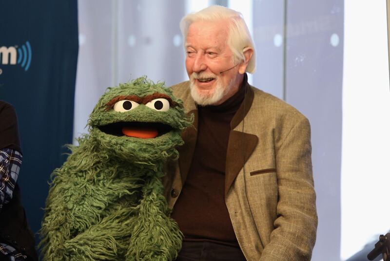(FILES) In this file photo taken on October 09, 2014 Caroll Spinney "Oscar and Big Bird" attends SiriusXM's Town Hall with original cast members from Sesame Street commemorating the 45th anniversary of the celebrated series debut on public television moderated by Weekend TODAY co-anchor Erica Hill in New York City.  Caroll Spinney, the big-hearted Muppeteer who play the Sesame Street character Big Bird for almost a half-century, died on December 8, 2019, Sesame Workshop announced. He was 85. / AFP / GETTY IMAGES NORTH AMERICA / Robin Marchant
