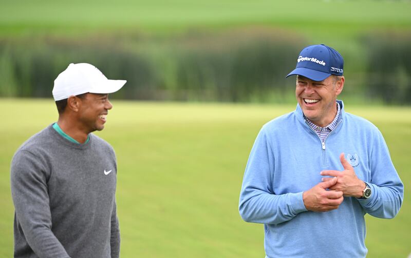 British entrepreneur Peter Jones with playing partner Tiger Woods. Getty Images