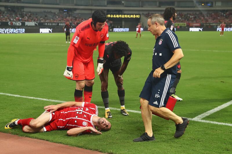 Bayern Munich's Franck Ribery goes down with an injury. Alexander Hassenstein / Getty Images
