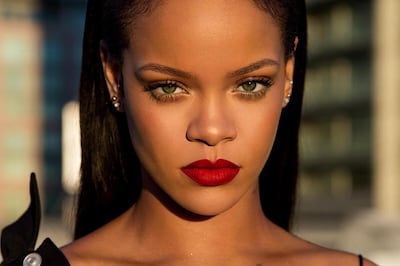 Rihanna wearing her own Fenty Beauty red lipstick. Photo Fenty Beauty