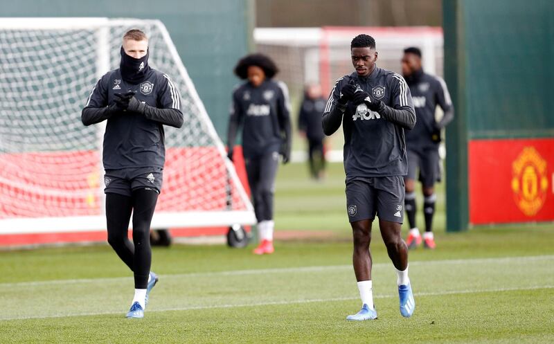 Manchester United's Scott McTominay and Axel Tuanzebe.