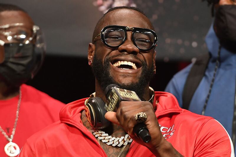 US boxer Deontay Wilder laughs off the insults from Fury. AFP