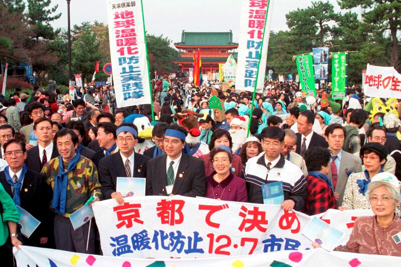 Demonstrators hold banners calling for a reduction in greenhouse gas emissions in Kyoto, Japan, in 1997. AP Photo