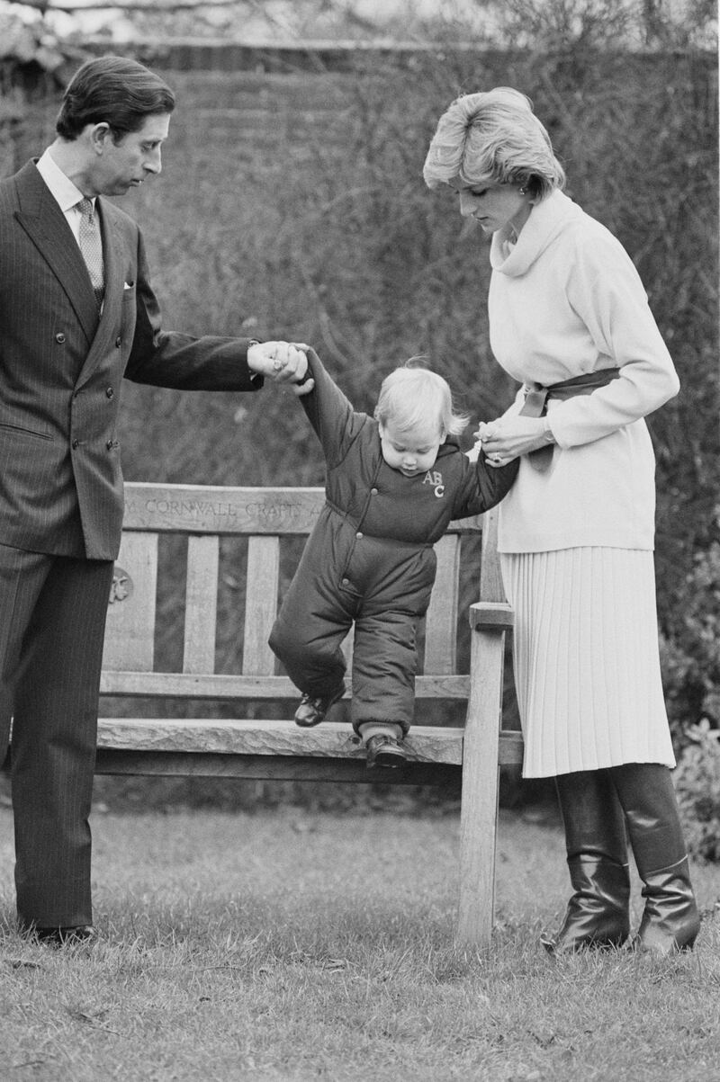 Charles, Prince of Wales, and Diana, Princess of Wales (1961 - 1997) with their son Prince William, Duke of Cambridge, UK, 14th December 1983. (Photo by Daily Express/Hulton Archive/Getty Images)