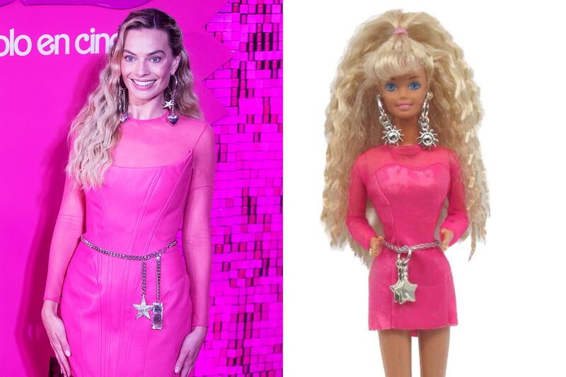 Mexico City: Robbie wore a neon pink leather Balmain mini dress, adding a star-shaped belt and earrings to channel 1992's Earring Magic Barbie. EPA; Mattel