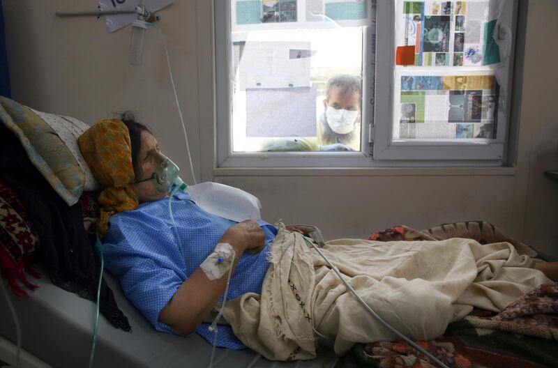A patient is connected to oxygen tank in the ICU ward for Covid-19 patients at the Afghan-Japan Communicable Disease Hospital.