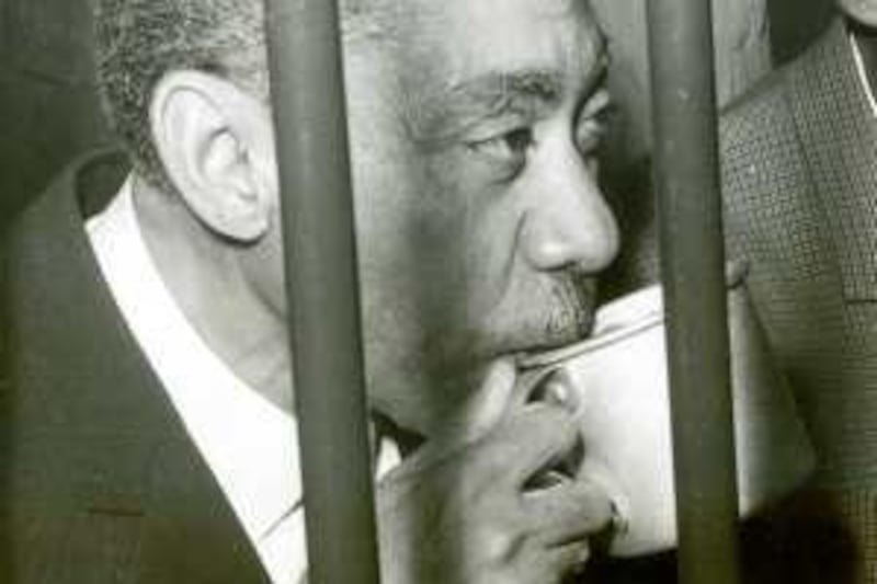 Sayyed Qutb drinks in 1966 a cup of water behind bars in Cairo. Sayyid Qutb (born 09 October 1906 in Musha ñ executed 29 August 1966) was an important theoretician of the Egyptian Muslim Brotherhood. The school of thought he inspired has become known as Qutbism. AFP PHOTO