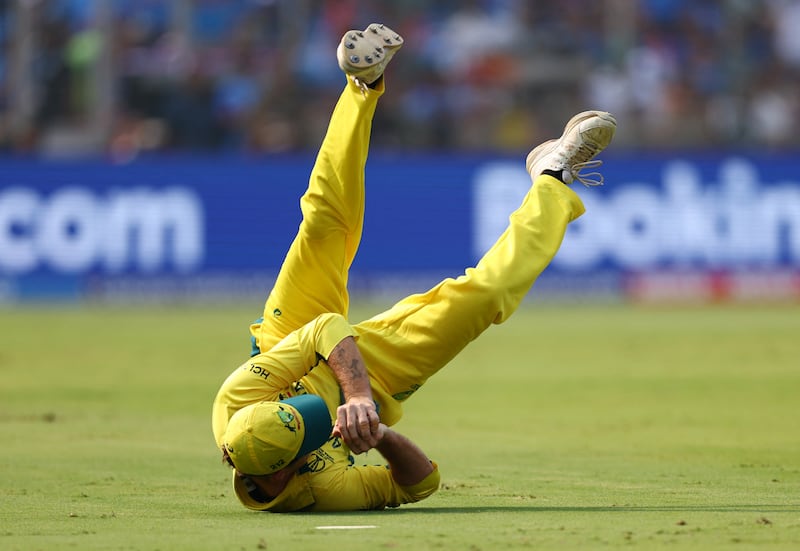 Australia's Adam Zampa takes the catch to dismiss India's Shubman Gill, off the bowling of Mitchell Starc. Reuters