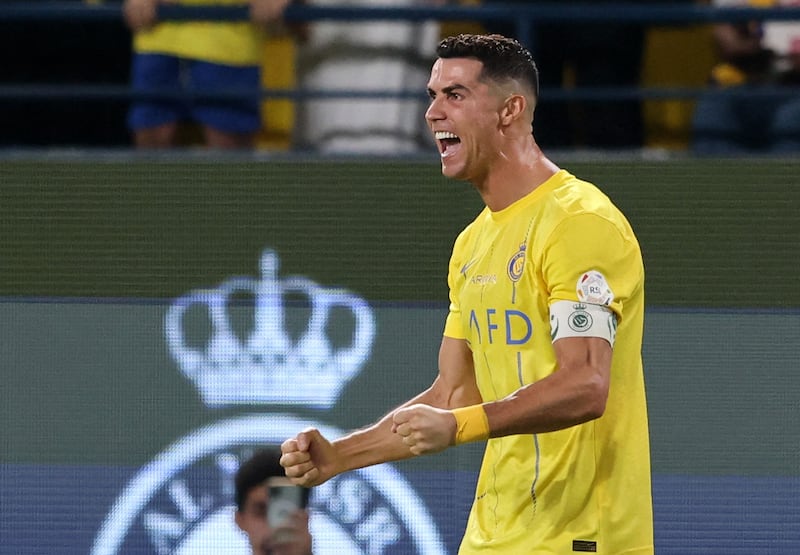 Cristiano Ronaldo celebrates Al Nassr's 4-3 win over Al Ahli. Reuters