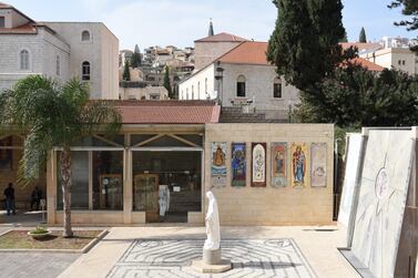 Images of the Virgin Mary and baby Jesus, at the Church of the Annunciation in Nazareth, Israel. Rosie Scammell / The National