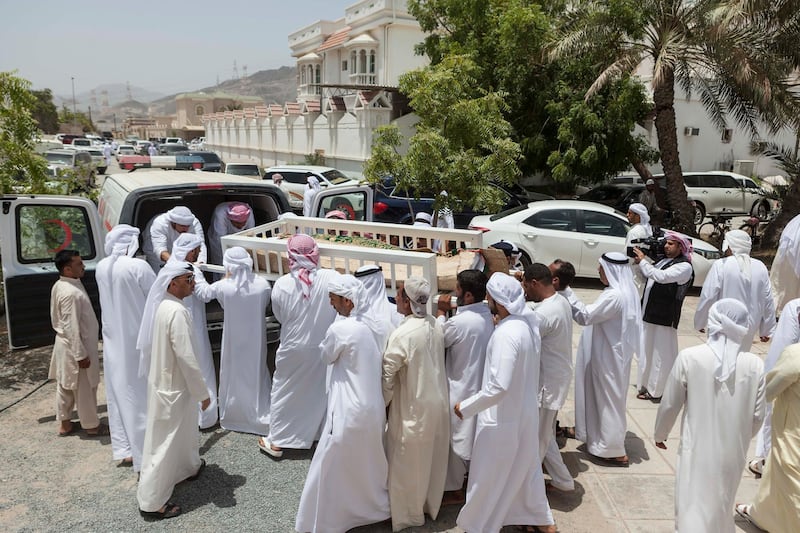 FUJEIRAH, UNITED ARAB EMIRATES, 19 JUNE 2017. The funeral of Emirati Athlete Abdullah Hayayei in Qidfa that died from an accident in London while training. Abdullah's remains leave the Zaid Bin Khatieb Mosque on it's way to the burial site. (Photo: Antonie Robertson/The National) Journalist: Ruba Haza. Section: National.