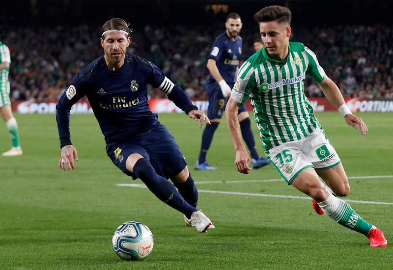 Sergio Ramos fights for the ball against Betis' Alex Moreno. AP Photo