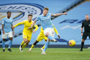 Soccer Football - Premier League - Manchester City v Fulham - Etihad Stadium, Manchester, Britain - December 5, 2020 Manchester City's Kevin De Bruyne scores their second goal from the penalty spot Pool via REUTERS/Dave Thompson EDITORIAL USE ONLY. No use with unauthorized audio, video, data, fixture lists, club/league logos or 'live' services. Online in-match use limited to 75 images, no video emulation. No use in betting, games or single club /league/player publications. Please contact your account representative for further details.