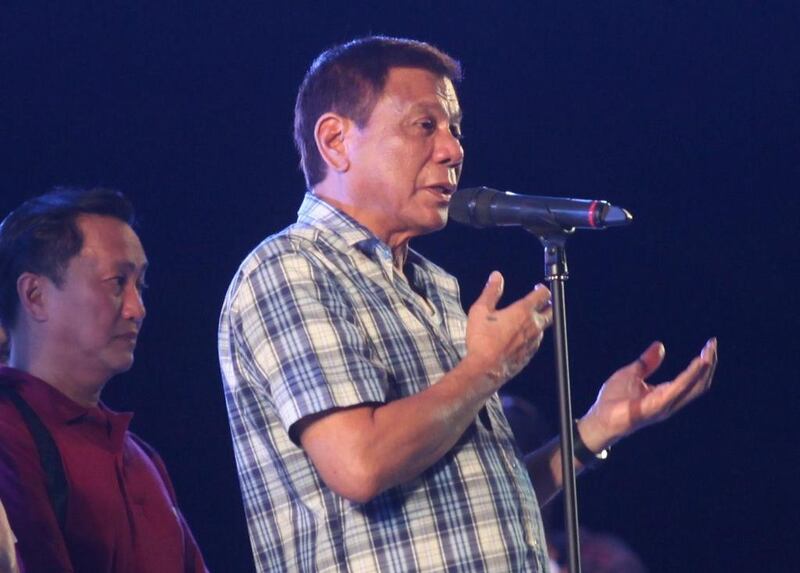 Philippine president-elect Rodrigo Duterte at his election victory celebration in Davao city in southern Philippines June 4, 2016. Mr Duterte has encouraged the public to help him in his war against crime, telling a huge crowd in the southern city of Davao that Filipinos who help him battle crime will be rewarded. Lean Daval Jr / Reuters