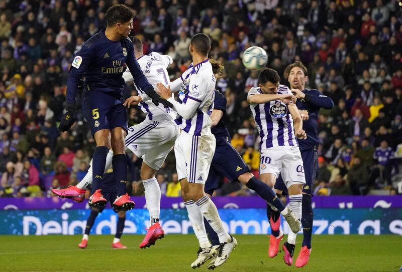 Real Madrid's Spanish defender Nacho heads the ball to score the only goal of the match. AFP