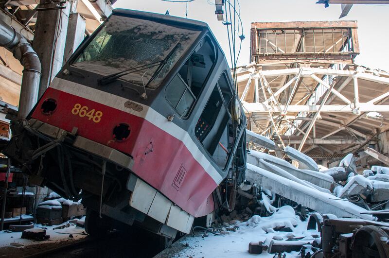 A tram damaged by shelling sits at a depot, in Kharkiv. AP