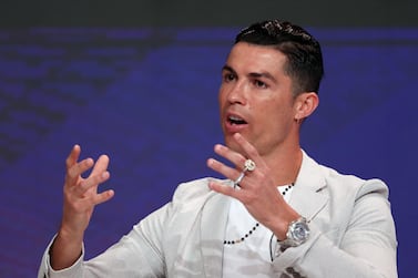 epa08092393 Portuguese international Cristiano Ronaldo of Juventus Turin attends during the 14th edition of Dubai International Sports Conference in Dubai, United Arab Emirates, 28 December 2019. The conference was launched in 2006 to bring football stakeholders together. EPA/ALI HAIDER