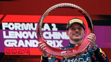 Red Bull Racing driver Max Verstappen of the Netherlands celebrates with his trophy after winning the Formula One Chinese Grand Prix, in Shanghai, China, 21 April 2024.  The 2024 Formula 1 Chinese Grand Prix is held at the Shanghai International Circuit racetrack on 21 April after a five-year hiatus.   EPA / ALEX PLAVEVSKI