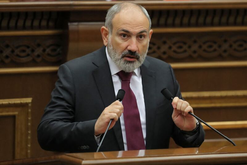 Armenian Prime Minister Nikol Pashinyan addresses the parliament in Yerevan. Armenia said 49 of its soldiers had been killed in the worst clashes with Azerbaijan since their war two years ago. AFP