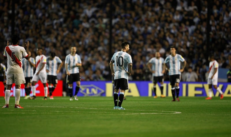 Lionel Messi, centre, and his Argentina teammates after the game. Martin Acosta / Reuters
