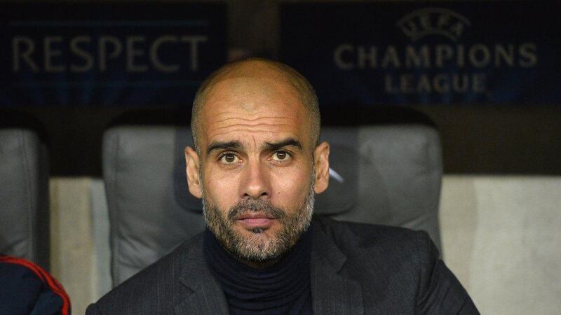 Bayern Munich manager Pep Guardiola looks on during his side's loss to Real Madrid on Tuesday night in the Champions League semi-final. Odd Andersen / AFP / April 29, 2014 

