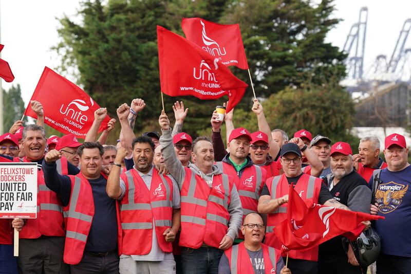 Members of the Unite union on a picket line at one of the entrances to the Port of Felixstowe in Suffolk. PA