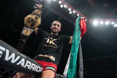 Mohammad Yahya celebrates after his victory in the UAE Warriors Arabia lightweight title at Jiu-Jitsu Arena in Abu Dhani on Friday, September 4, 2021. Courtesy Palms Sports