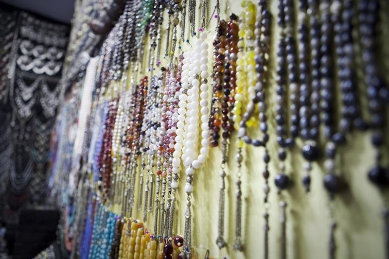 Prayer beads come in many different colours, with prices ranging from a few hundred dirhams to thousands. Razan Alzayani / The National 