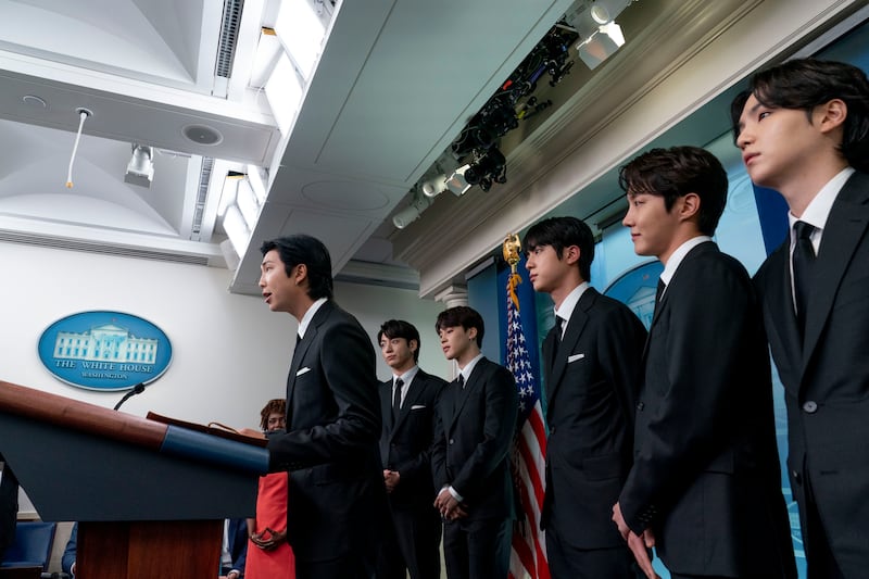 RM speaks, accompanied by other BTS members, during the daily briefing at the White House. AP