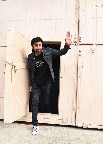 In this picture taken on June 27, 2018, Indian Bollywood actor Ranbir Kapoor poses for a picture during the promotion of the upcoming biographical Hindi film 'Sanju' in Mumbai. A Indian biopic out June 29 charts the troubled life of Bollywood star Sanjay Dutt, including his battles with drug addiction and jail time for keeping illegal weapons. / AFP / Sujit Jaiswal
