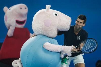 epaselect epa07276403 Novak Djokovic of Serbia in action during the Kids Tennis Day at the Rod Laver Arena ahead of the Australian Open tennis tournament in Melbourne, Australia, 12 January 2019.  EPA/MAST IRHAM