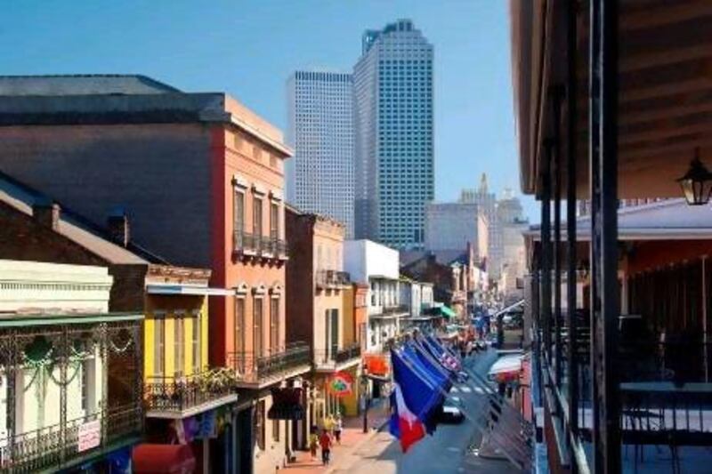 Bourbon Street and the French Quarter, marked by lusciously coloured buildings and cast iron balconies, are best explored on foot. Don Klumpp /Getty Images