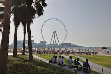 The Ain Dubai (Dubai Eye), a 250-metres high Ferris wheel, is pictured in the skyline, on September 30, 2021 on the day of the Expo 2020 opening.  - The Covid-delayed Expo 2020 kicks off today in Dubai with an extravagant opening ceremony in the evening for what is expected to be the world's biggest event since the start of the pandemic.  (Photo by Giuseppe CACACE  /  AFP)
