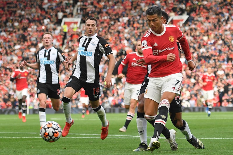 Manchester United's Cristiano Ronaldo scores against Newcastle at Old Trafford. AFP