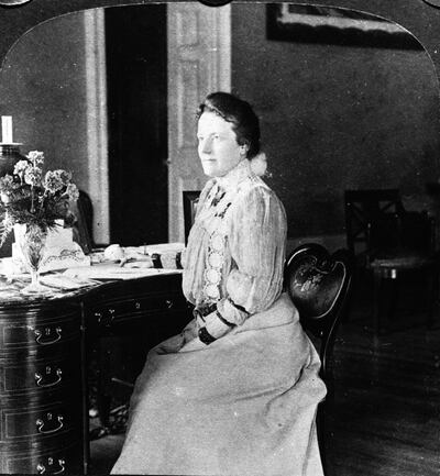 U.S. First Lady Edith Roosevelt (1861 - 1948) sits at her desk in the second floor private library of the White House, 1903. She was the second wife of president Theodore Roosevelt. (Photo by Hulton Archive/Getty Images) 