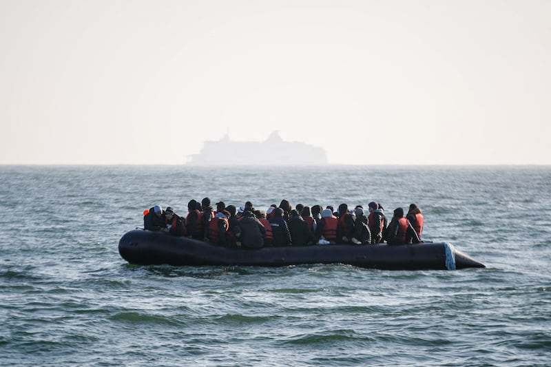 Migrants wait for help in the Channel. 