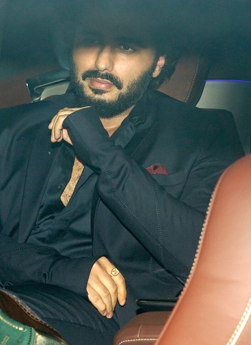 Arjun Kapoor arrives at the post-wedding reception. Getty Images
