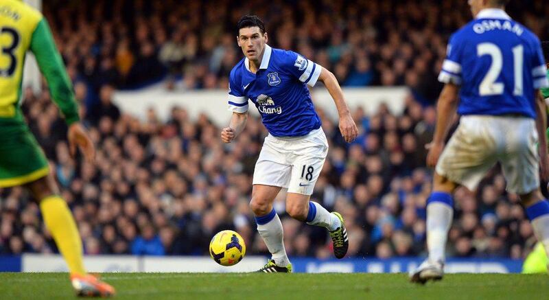 Centre midfield: Gareth Barry, Everton. A brilliant long-range strike against Norwich was the ideal way to bring up a half-century of league goals. Paul Ellis / AFP