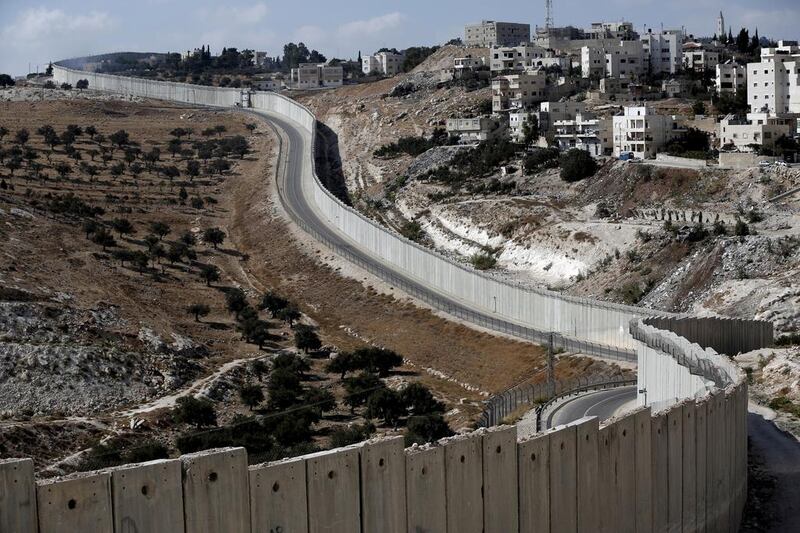 Israel's illegal occupation, separation wall building and settlement construction have been continuing at pace for decades. AFP