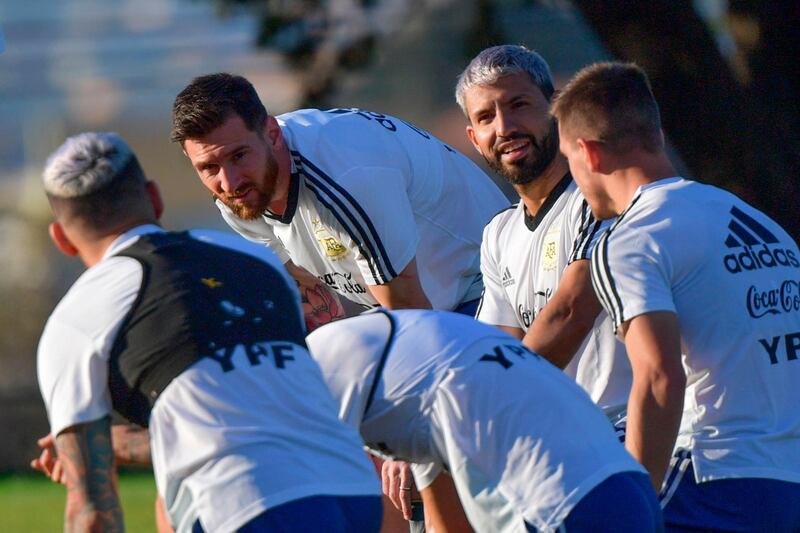 Argentina players including Sergio Aguero, second right, talk during training. AFP