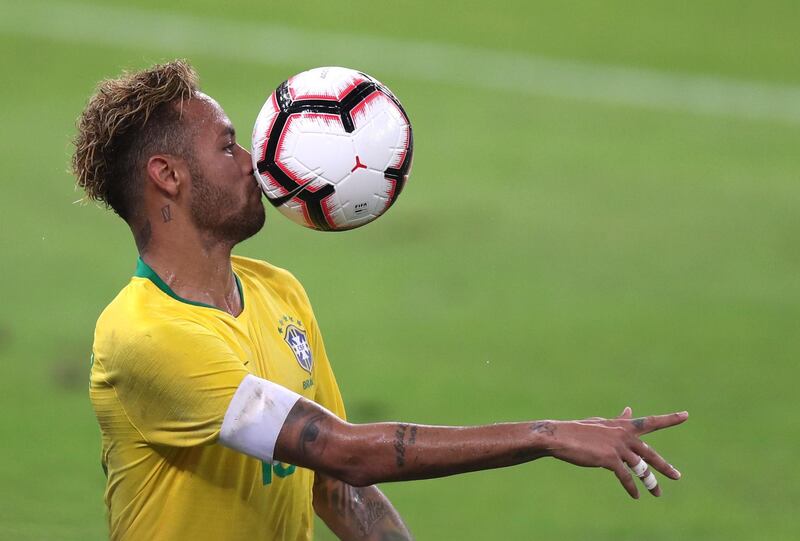 Neymar controls the ball during the match at King Abdullah Stadium. AP Photo