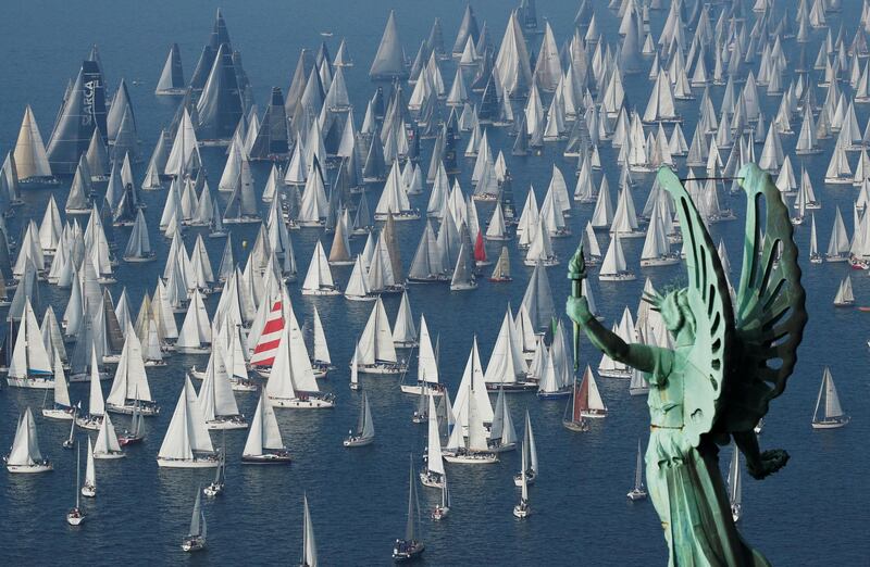 Sailing boats gather at the start of the Barcolana regatta in front of Trieste harbour, Italy, on Sunday, October 13. Reuters
