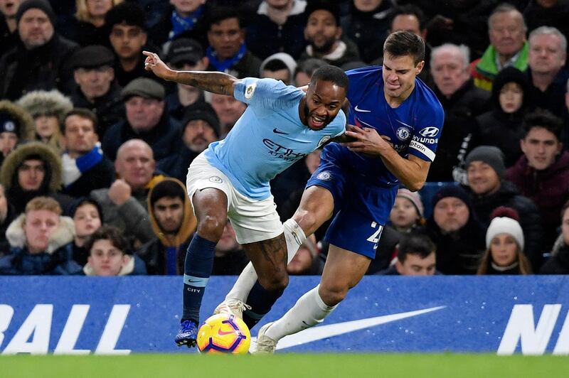 epa07218149 Chelsea's Cesar Azpilicueta (R) vies for the ball against Manchester City's Raheem Sterling (L) during the English Premier League soccer match Chelsea vs Manchester City  at the Stamford Bridge Stadium, London, Britain, 08 December 2018.  EPA/WILL OLIVER EDITORIAL USE ONLY. No use with unauthorized audio, video, data, fixture lists, club/league logos or 'live' services. Online in-match use limited to 75 images, no video emulation. No use in betting, games or single club/league/player publications