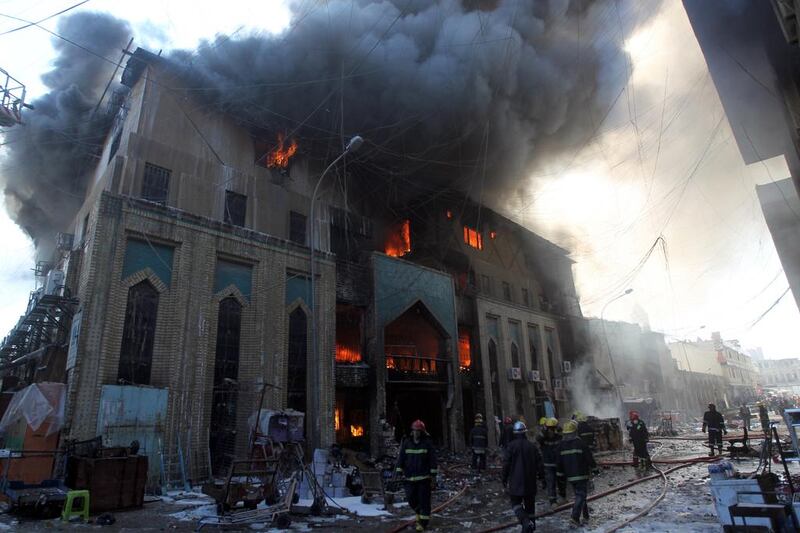 Baghdad’s Shorjah market, which dates back 700 years, went up in flames after two bomb blasts hit the structure on February 13, killing at least two and wounding at least 11. Ahmad al-Rubaye / AFP

