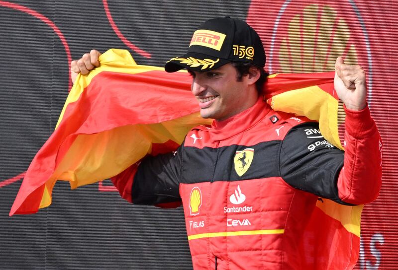 Ferrari's Carlos Sainz celebrates after winning the British GP. AFP