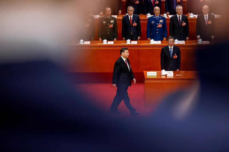 Chinese President Xi Jinping prepares to take his oath during the National People's Congress at the Great Hall of the People in Beijing. EPA