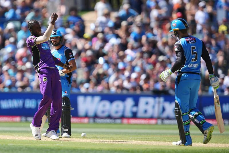 ADELAIDE, AUSTRALIA - FEBRUARY 04: Jofra Archer of the Hurricanes celebrates the wicket of Alex Carey of the Strikers during the Big Bash League Final match between the Adelaide Strikers and the Hobart Hurricanes at Adelaide Oval on February 4, 2018 in Adelaide, Australia.  (Photo by Paul Kane/Getty Images)